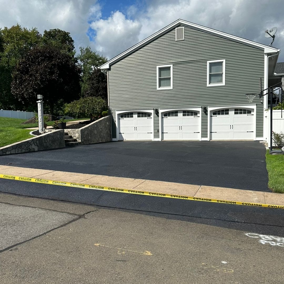 Triple garage driveway sealcoated